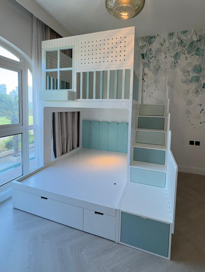 White bunk bed with storage drawers and stairs