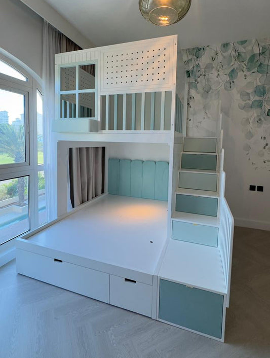 White bunk bed with storage drawers and stairs